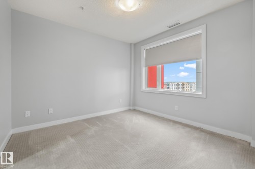 810 5151 Windermere Boulevard, Edmonton, AB - Indoor Photo Showing Other Room