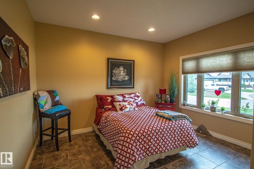 Bedroom with baseboards and recessed lighting - 5753 43 Ave, St. Paul Town, AB - Indoor Photo Showing Bedroom