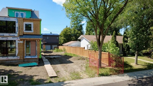 View of yard featuring driveway - 7806 145 Street Nw, Edmonton, AB 