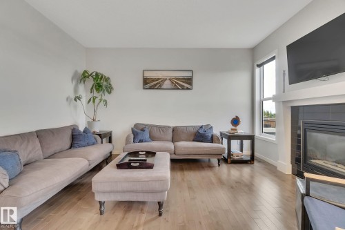 2047 Redtail Common, Edmonton, AB - Indoor Photo Showing Living Room With Fireplace