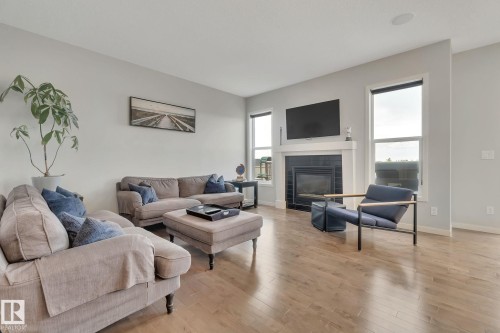 2047 Redtail Common, Edmonton, AB - Indoor Photo Showing Living Room With Fireplace