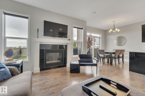 2047 Redtail Common, Edmonton, AB - Indoor Photo Showing Living Room With Fireplace
