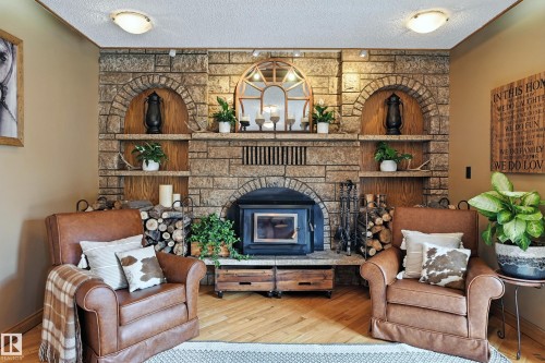 16815 41 Avenue, Edmonton, AB - Indoor Photo Showing Living Room With Fireplace