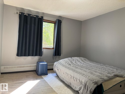 212 5705 51 Street, Elk Point, AB - Indoor Photo Showing Bedroom