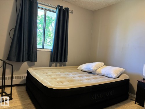 212 5705 51 Street, Elk Point, AB - Indoor Photo Showing Bedroom