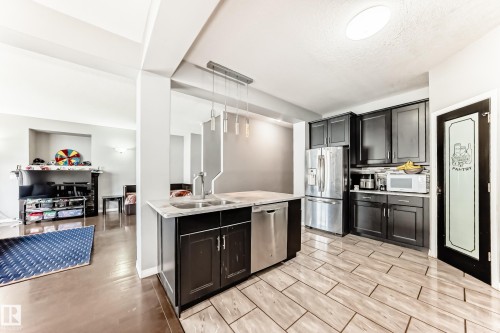 16720 61 Street, Edmonton, AB - Indoor Photo Showing Kitchen With Double Sink