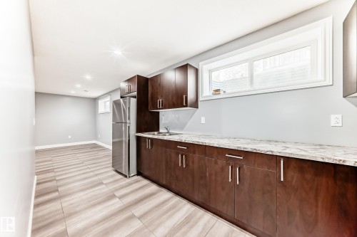 16720 61 Street, Edmonton, AB - Indoor Photo Showing Kitchen With Double Sink