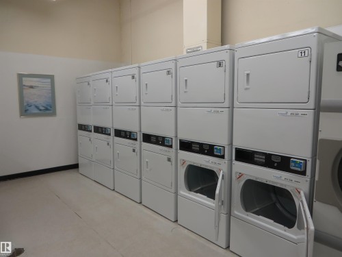 911 10883 Saskatchewan Drive, Edmonton, AB - Indoor Photo Showing Laundry Room