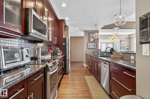 1904 9020 Jasper Avenue, Edmonton, AB - Indoor Photo Showing Kitchen With Upgraded Kitchen
