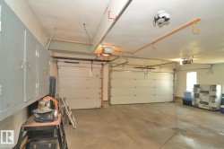 Garage featuring a garage door opener - 