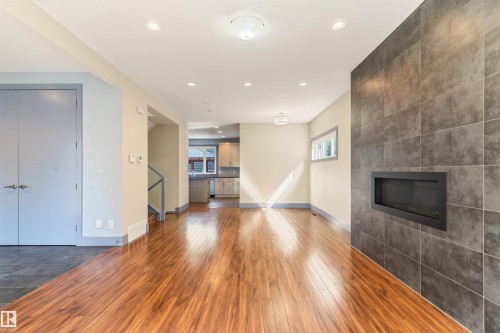 9533 101 Street, Edmonton, AB - Indoor Photo Showing Living Room With Fireplace