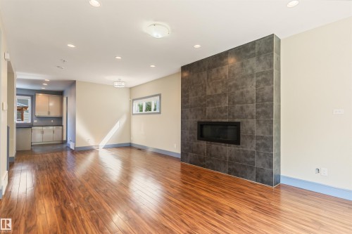 9533 101 Street, Edmonton, AB - Indoor Photo Showing Living Room With Fireplace