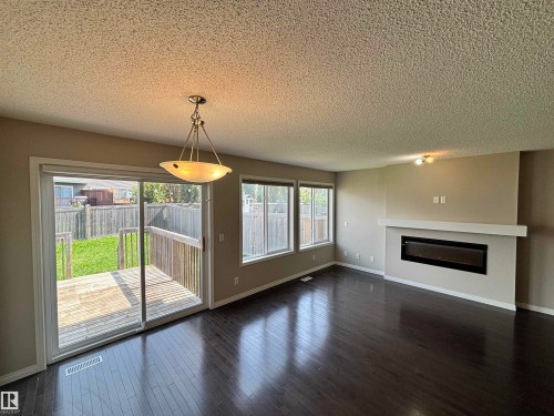 2317 76 Street, Edmonton, AB - Indoor With Fireplace