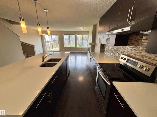 2317 76 Street, Edmonton, AB - Indoor Photo Showing Kitchen With Double Sink