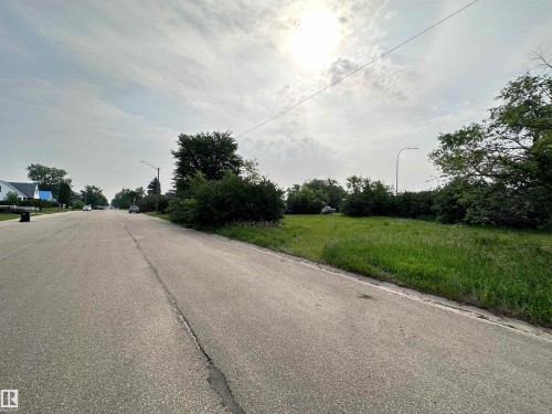 View of asphalt road with street lights - 9819 105 Street, Westlock, AB 