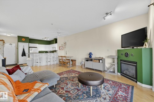 111 4312 139 Avenue, Edmonton, AB - Indoor Photo Showing Living Room With Fireplace
