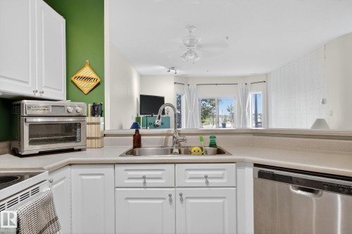111 4312 139 Avenue, Edmonton, AB - Indoor Photo Showing Kitchen With Double Sink