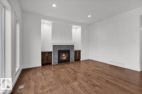 20517 98A Avenue, Edmonton, AB - Indoor Photo Showing Living Room With Fireplace