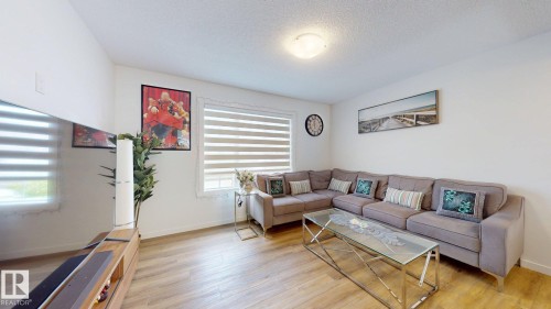 64 1110 Daniels Link Link, Edmonton, AB - Indoor Photo Showing Living Room