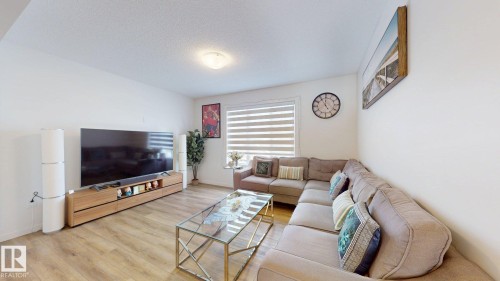 64 1110 Daniels Link Link, Edmonton, AB - Indoor Photo Showing Living Room