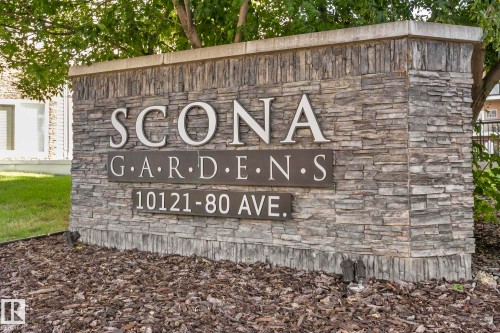 Exterior stone signage for "SCONA GARDENS" with visible address numbers - 334 10121 80 Avenue, Edmonton, AB - Outdoor