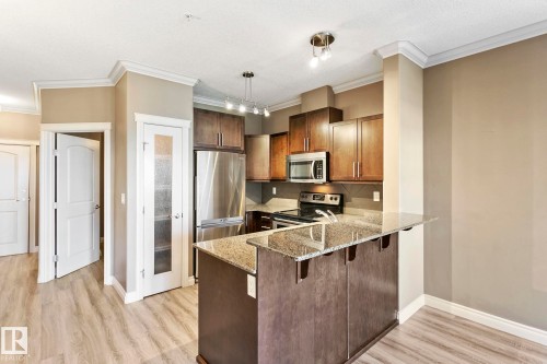 334 10121 80 Avenue, Edmonton, AB - Indoor Photo Showing Kitchen With Stainless Steel Kitchen With Upgraded Kitchen
