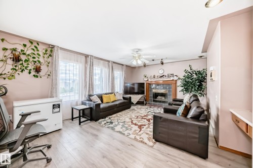 1068 James Crescent, Edmonton, AB - Indoor Photo Showing Living Room With Fireplace