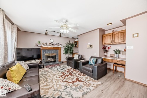 1068 James Crescent, Edmonton, AB - Indoor Photo Showing Living Room With Fireplace