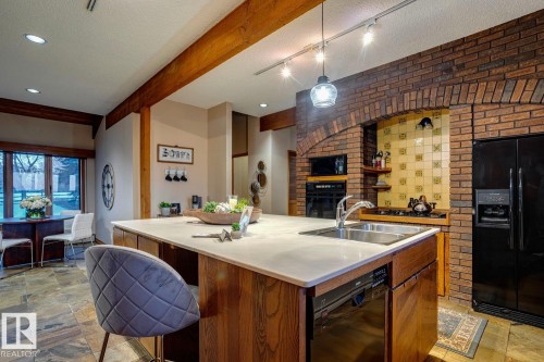 18420 8A Avenue, Edmonton, AB - Indoor Photo Showing Kitchen With Double Sink