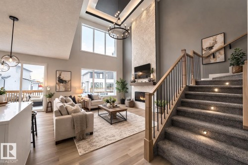 Move in Ready  Virtually staged - 18 Mockingbird Crescent, Fort Saskatchewan, AB - Indoor With Fireplace