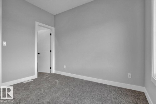 65 Blackbird Bend, Fort Saskatchewan, AB - Indoor Photo Showing Other Room