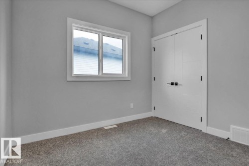 65 Blackbird Bend, Fort Saskatchewan, AB - Indoor Photo Showing Other Room