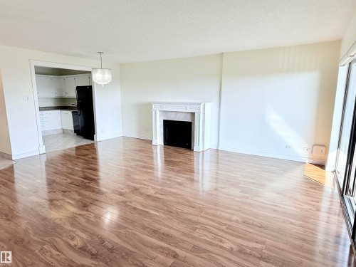 604 11027 87 Avenue, Edmonton, AB - Indoor Photo Showing Living Room With Fireplace