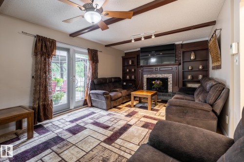 10820 170 Avenue Nw, Edmonton, AB - Indoor Photo Showing Living Room With Fireplace