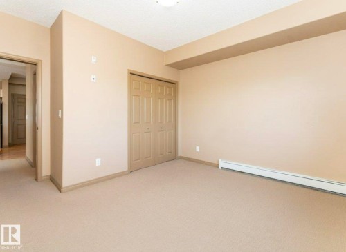 209 5280 Terwillegar Boulevard Nw, Edmonton, AB - Indoor Photo Showing Other Room