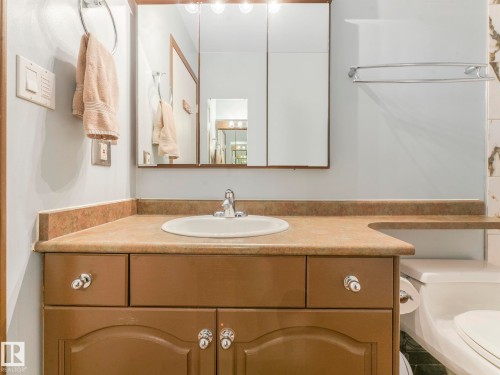 Bathroom with vanity and toilet - 3608 15 Avenue, Edmonton, AB - Indoor Photo Showing Other Room