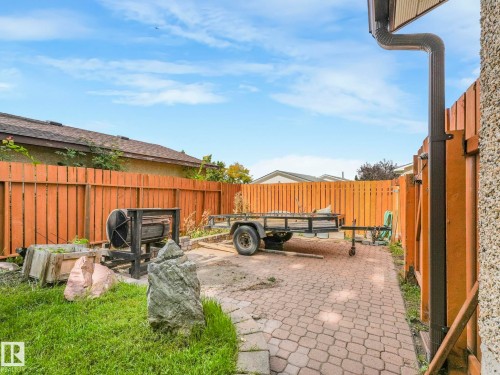 Fenced backyard featuring a Rear RV Parking off Lane. - 3608 15 Avenue, Edmonton, AB - Outdoor