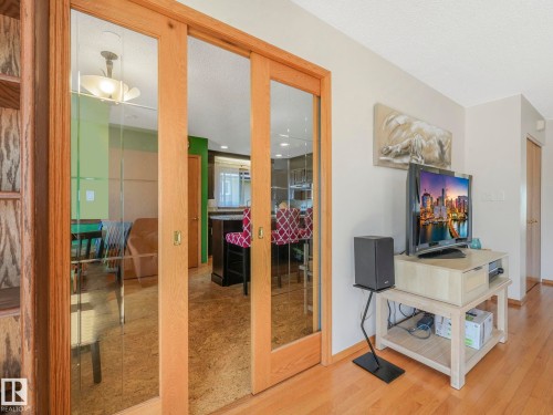 Fashionable French Doors Adds Privacy between Living Room & Kitchen. - 3608 15 Avenue, Edmonton, AB - Indoor Photo Showing Other Room