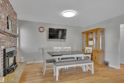 6720 20 Avenue, Edmonton, AB - Indoor Photo Showing Dining Room With Fireplace