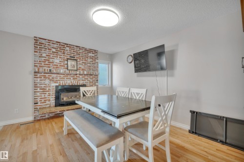 6720 20 Avenue, Edmonton, AB - Indoor Photo Showing Other Room With Fireplace