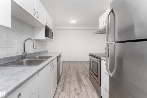 4B 13230 Fort Road, Edmonton, AB - Indoor Photo Showing Kitchen With Double Sink
