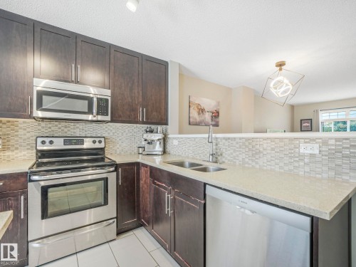 128 1804 70 Street, Edmonton, AB - Indoor Photo Showing Kitchen With Double Sink With Upgraded Kitchen