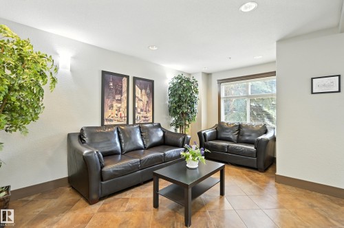 212 11615 Ellerslie Road Sw, Edmonton, AB - Indoor Photo Showing Living Room