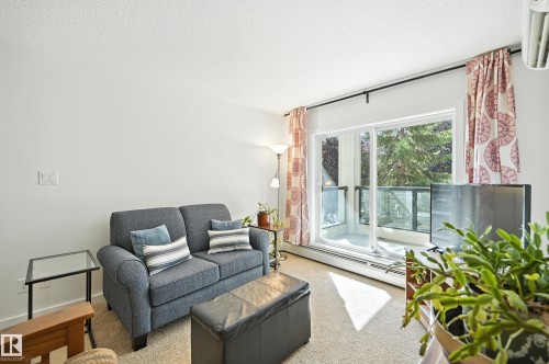 212 11615 Ellerslie Road Sw, Edmonton, AB - Indoor Photo Showing Living Room