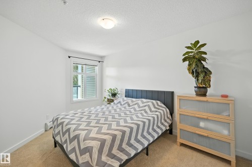 212 11615 Ellerslie Road Sw, Edmonton, AB - Indoor Photo Showing Bedroom