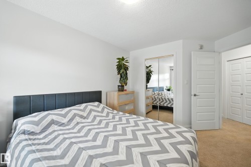 212 11615 Ellerslie Road Sw, Edmonton, AB - Indoor Photo Showing Bedroom