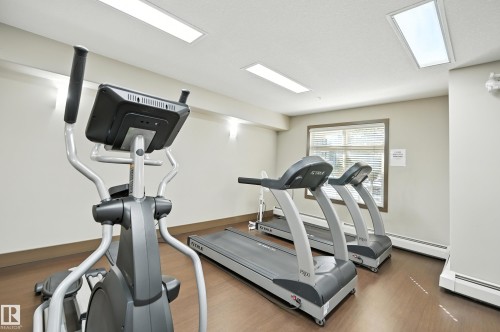 212 11615 Ellerslie Road Sw, Edmonton, AB - Indoor Photo Showing Gym Room