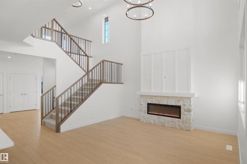 20608 27 Avenue, Edmonton, AB - Indoor Photo Showing Other Room With Fireplace