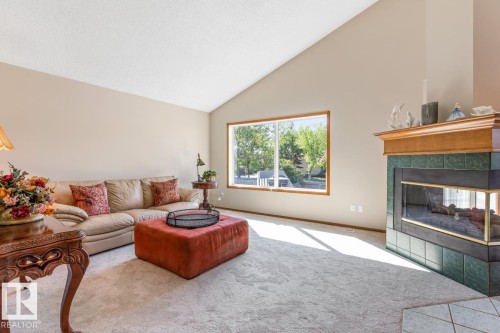 11735 10 Avenue Nw, Edmonton, AB - Indoor Photo Showing Living Room With Fireplace