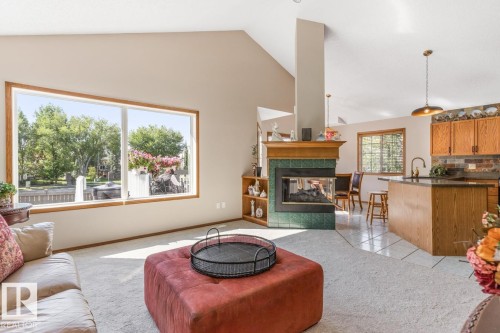 11735 10 Avenue Nw, Edmonton, AB - Indoor Photo Showing Living Room With Fireplace